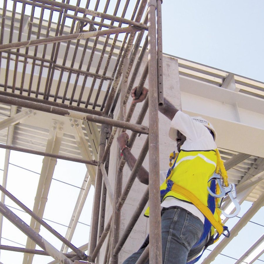 Construction Worker on a Construction Site with Helmet and Jacket